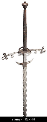 A two-handed flamberge, a high-grade collector's reproduction in the style of the 16th century Wavy blade with downcurved guards, above the guards on one side an etched coat of arms and the date 1597, on the other the image of a warrior and floral ornaments. Ricasso with remains of leather cover. Extended cross-guard with volute ornaments, symmetrical side rings and guard plates within. Leather-covered grip with wire winding. Conical pommel with small riveted finial. Length 176 cm. Decorative replica, true to original. historic, historical, sword, Additional-Rights-Clearance-Info-Not-Available Stock Photo