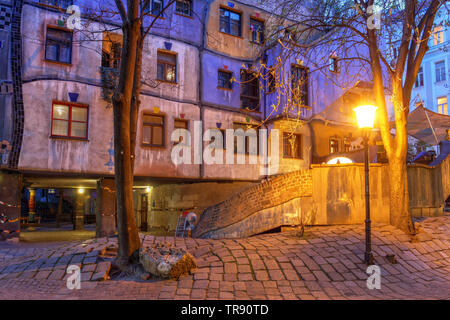 Street scene with the Hundertwasserhaus in Vienna, Austria Stock Photo