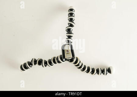 Mini table flexible tripod on white background Stock Photo
