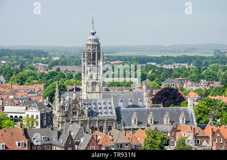 Middelburg, The Netherlands, May 30, 2019: aerial view of the city hall and its tower, built in late-gothic style around 1500, with in the background Stock Photo