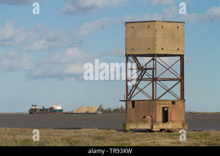 A disused World War 2 radar control tower disguised as a water tower on the banks of the river Thames near Coalhouse Fort, Tilbury, Essex. Stock Photo