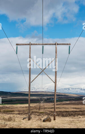 Electricity transmission lines in northern Iceland Stock Photo