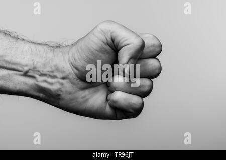 close up of a mans clenched fist, black and white Stock Photo