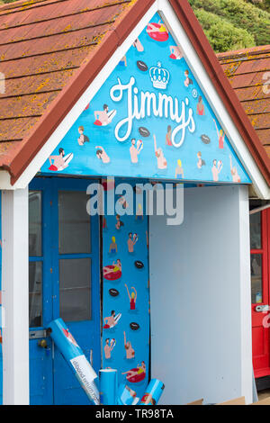 Great coffee in the original paper cup. It is located on a windowsill ...