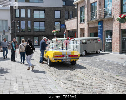 Melsele, Belgium, 30 may 2019, Yellow mustang 428 Cobra jet, on a car show with many people in the picture Stock Photo