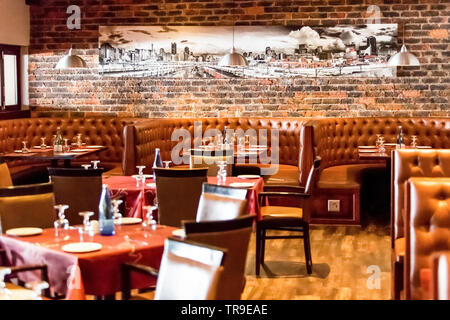 Johannesburg, South Africa - August 07 2013: Interior of Booth Style Restaurant Diner with Brown Interior Stock Photo