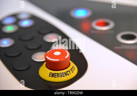 Keyboard with red emergency button in the foreground Stock Photo