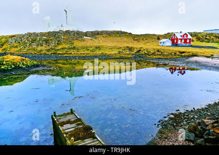 View of the beautiful red house at Stykkisholmur town in western Iceland in winter. Stock Photo