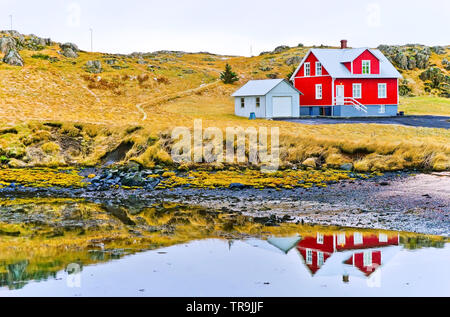 View of the beautiful red house at Stykkisholmur town in western Iceland in winter. Stock Photo