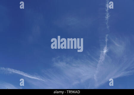 Blue sky with white clouds, UK Stock Photo