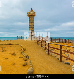 Lighthouse of Santa Elena Cape in Ecuador near Salinas city, marking the most western point of the country into the Pacific Ocean. Stock Photo