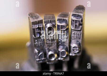 Macrophotography of typewriter hammers with HOPE word. Stock Photo