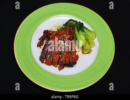 char siu pork chops with bok choi Stock Photo
