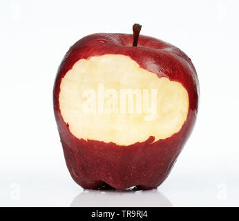 Close up of red apple with bite isolated on white background Stock Photo