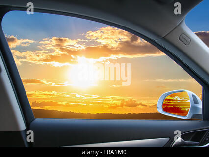 Heavenly landscape behind  car window Stock Photo