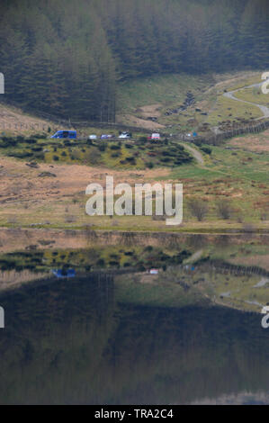 Haweswater Reservoir and the Car Park at Mardale Head from the Ascent of High Street in the Lake District National Park, Cumbria, England, UK. Stock Photo