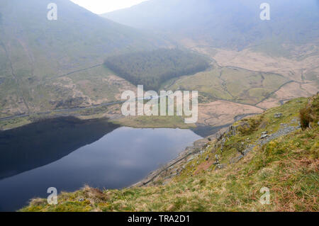 Haweswater Reservoir and the Car Park at Mardale Head from the Ascent of High Street in the Lake District National Park, Cumbria, England, UK. Stock Photo