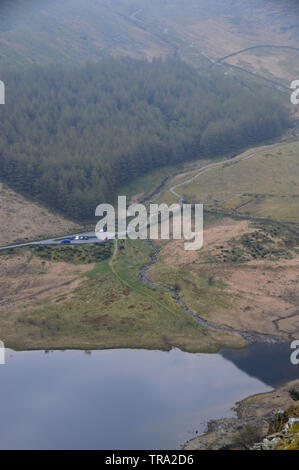 Haweswater Reservoir and the Car Park at Mardale Head from the Ascent of High Street in the Lake District National Park, Cumbria, England, UK. Stock Photo