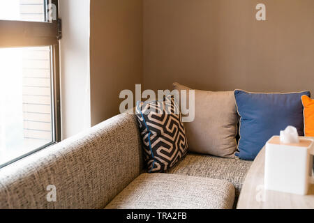 Home design interior, Cozy sofa on living room with colorful pillow. Stock Photo
