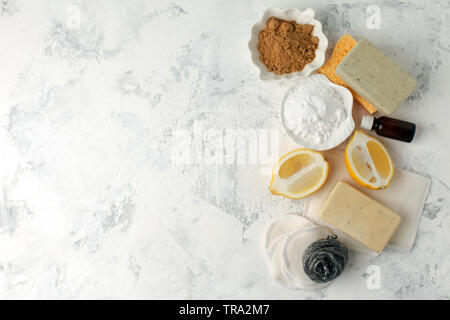 compostable domestic cleaning tools. Metal dish brush, cellulose sponge, rags, soap, lemon, essential oils . Eco friendly concept, flat lay, copy spac Stock Photo