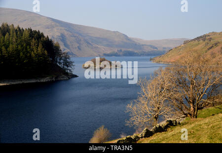 The Island of Wood Howe on Haweswater Reservoir from the Car Park at Mardale Head , Lake District National Park, Cumbria, UK. Stock Photo