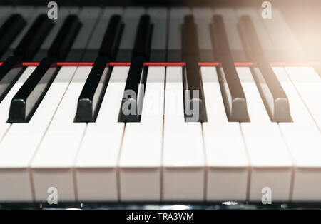 classic Piano keyboard closeup with warm light and selective focus, music instruments concept Stock Photo