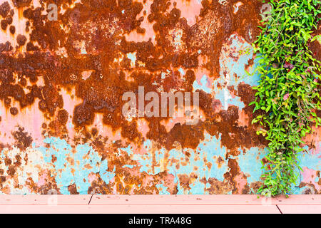 Grunge texture of old rusty metal with scratches and cracks background. Rusty Zinc Background. Old and rusty damaged texture. Stock Photo