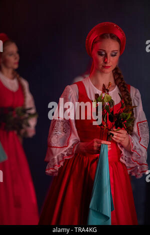 Artists of the State academic choreographic ensemble 'Berezka' on a stage with a round dance 'birch' in Moscow, Russia Stock Photo