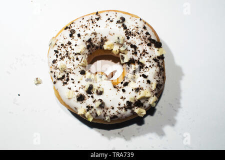 Delicious frosted doughnut isolated on a white background Stock Photo