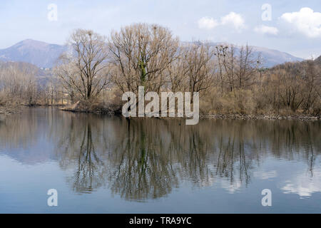 Cycleway along the Adda river near Imbersago and Brivio (Lombardy, Italy) at winter Stock Photo