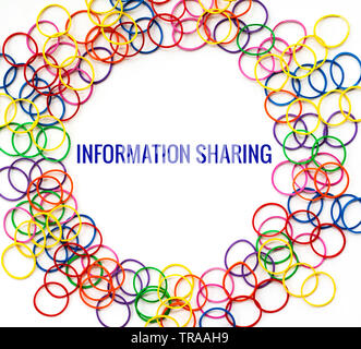 Information sharing concept, colorful rubber band with word Information Sharing on white background Stock Photo