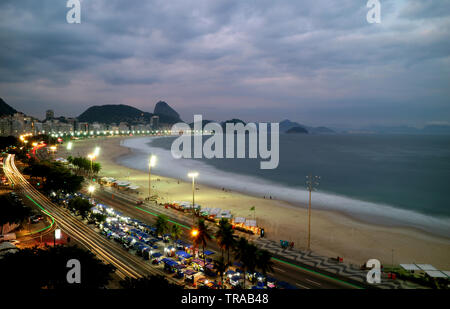 Stunning aerial view of Copacabana Beach and Sugar Loaf mountain at twilight, Rio de Janeiro, Brazil, South America Stock Photo