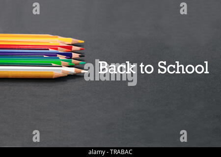 back to school Concept. Close up shot of color pencil pile pencil nibs on black background Stock Photo