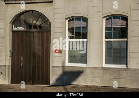 Close-up of house facade at sunset in Tielt. Charming and quiet village in the countryside of Belgium. Stock Photo
