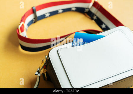 a credit card in a white shoulder bag, ready shopping concept Stock Photo