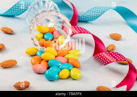Almond candy; Sugared Almonds on white background. Stock Photo