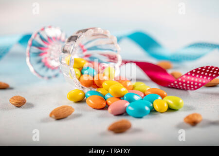 Almond candy; Sugared Almonds on white background. Stock Photo