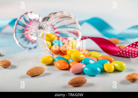 Almond candy; Sugared Almonds on white background. Stock Photo