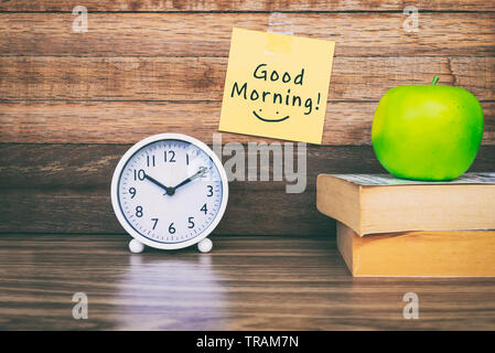 Good morning greeting on sticky notes, office desk. Stock Photo