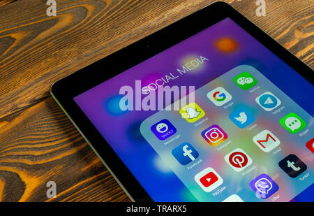 Sankt-Petersburg, Russia, May 30 2018: Apple iPad Pro with icons of social media facebook, instagram, twitter, snapchat application on screen. Social Stock Photo
