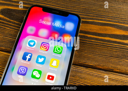 Sankt-Petersburg, Russia, May 30 2018: Apple iPhone X with icons of social media facebook, instagram, twitter, snapchat application on screen. Social Stock Photo