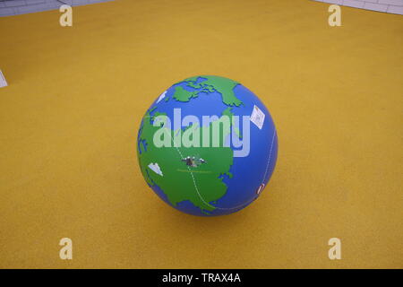 Earth globe standing on the roof of Lego House. Billund, Denmark 2017 Stock Photo