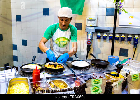 27th May 2019 Free From Festival, street food vendor preparing Brazilian style flatbreads (Beijummy) London, UK Stock Photo