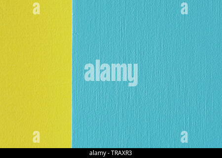 Close up abstract image of yellow and light blue painted wooden panels Stock Photo