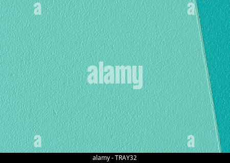 Macro image of a two tone teal painted wooden background panel Stock Photo