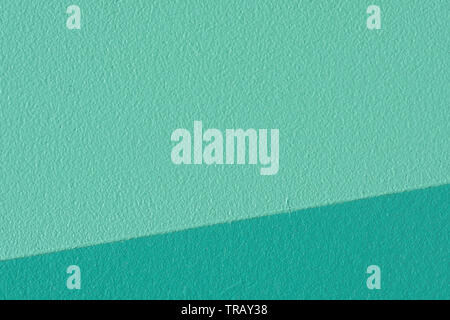 Macro image of a two tone teal painted wooden background panel Stock Photo