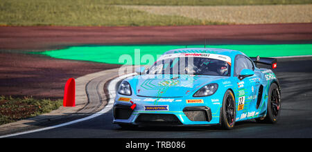 Oschersleben, Germany, April 27, 2019: Porsche Cayman GT4 by Team Allied-Racing driven by Lars Kern during ADAC GT4 at the Motorsport Arena Stock Photo