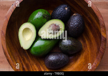 Avocados in a bowl Stock Photo