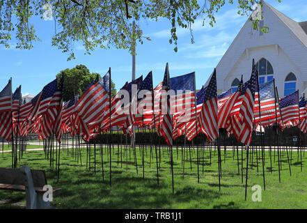 Memorial Day in USA - American flags arranged in rows on Fort Square, Quincy, Massachusetts Stock Photo