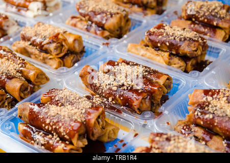 Fried spring rolls or Popiah is a famous Malaysian traditional street food with selective focus Stock Photo